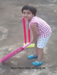 Daniela. B. Peter playing cricket on terrace